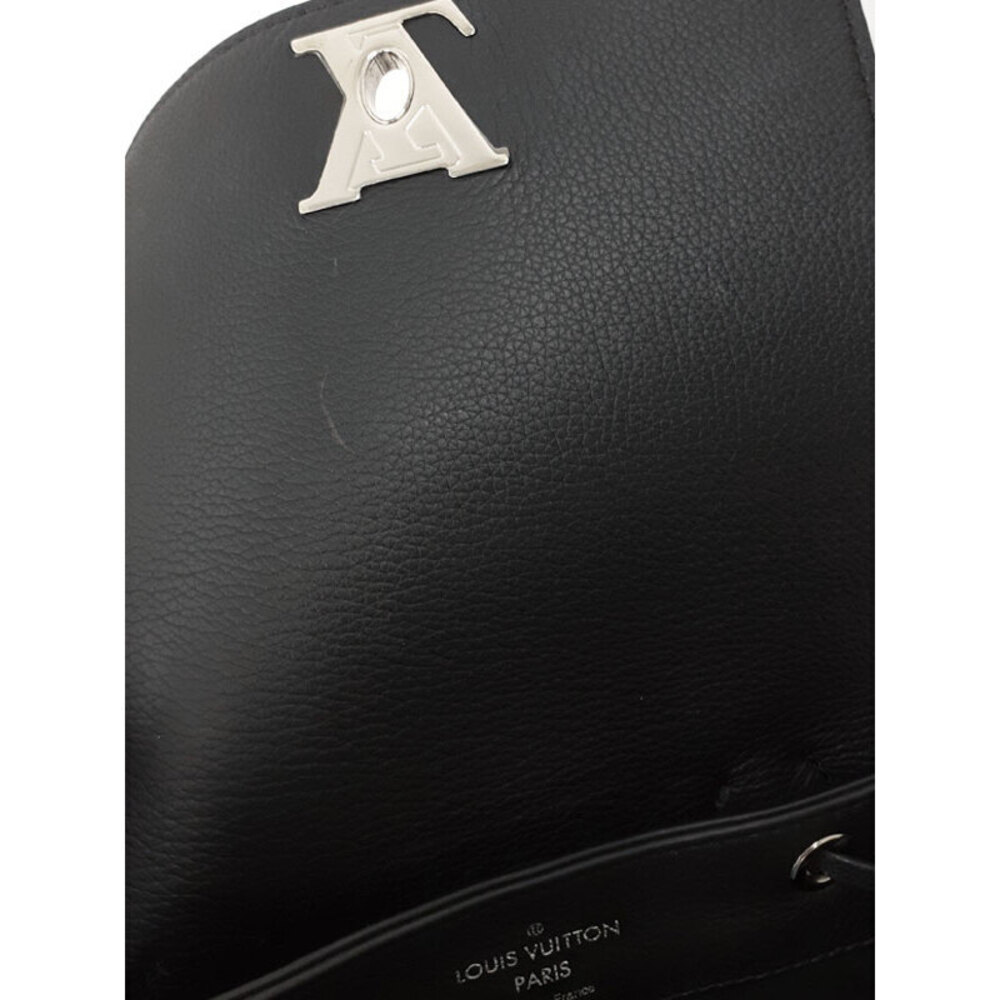 Louis Vuitton Lock Me Backpack - Picture 8 of 9